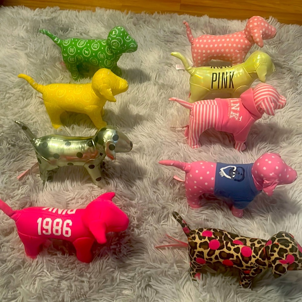 8 Pink Victoria Secret dogs the whole lot for $120 or $15  individually